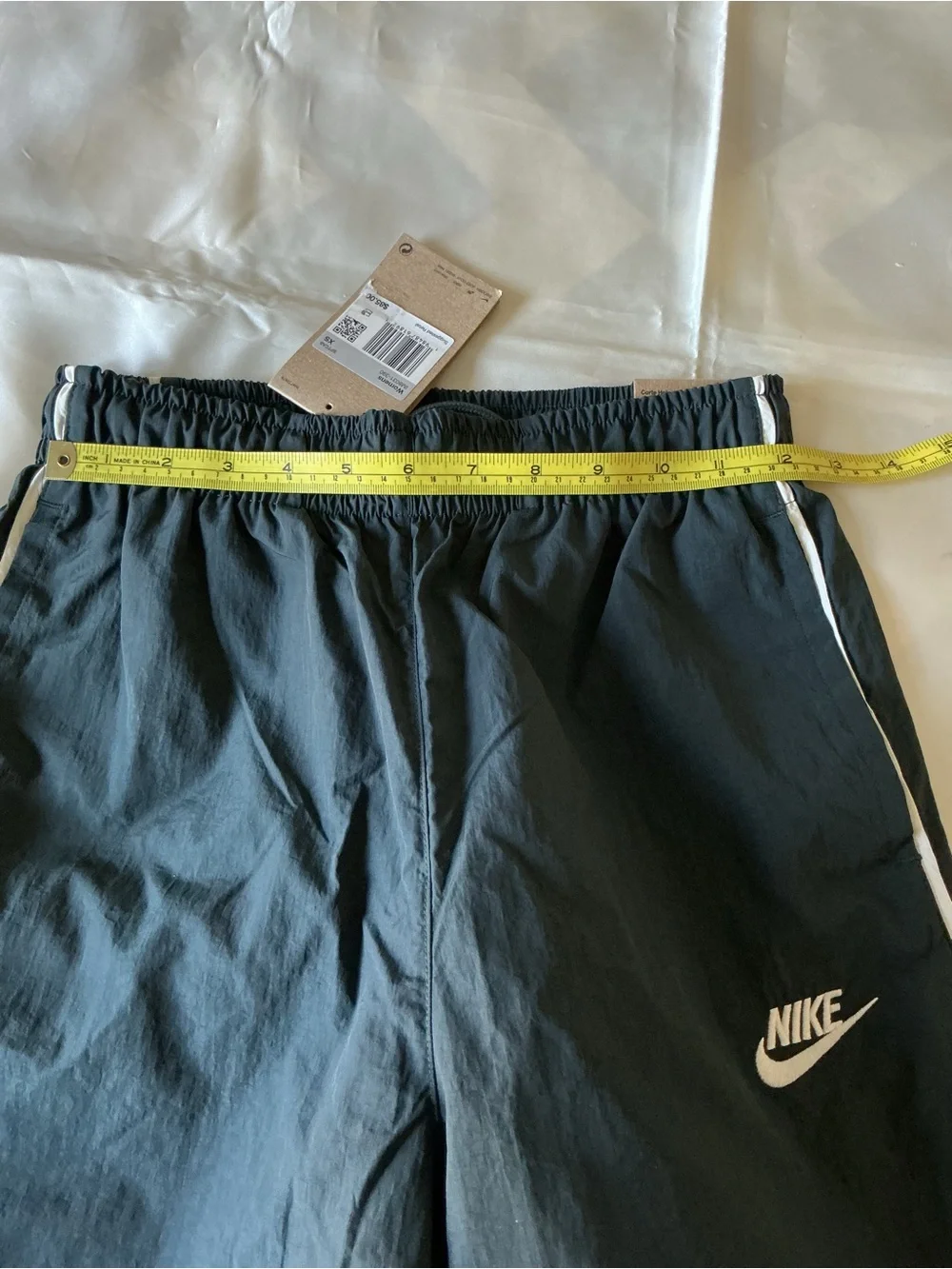 Nike women’s black track pants athletic windbreaker white stripe XS